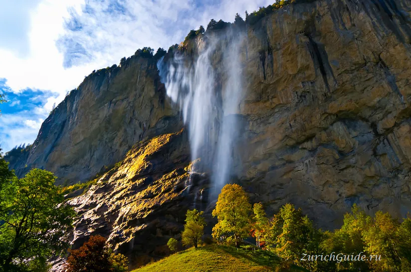 The Staubbach waterfall falling free of the cliff above Lauterbrunnen