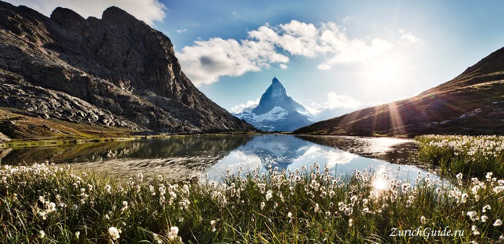 The Matterhorn reflected in a mountain lake above Zermatt